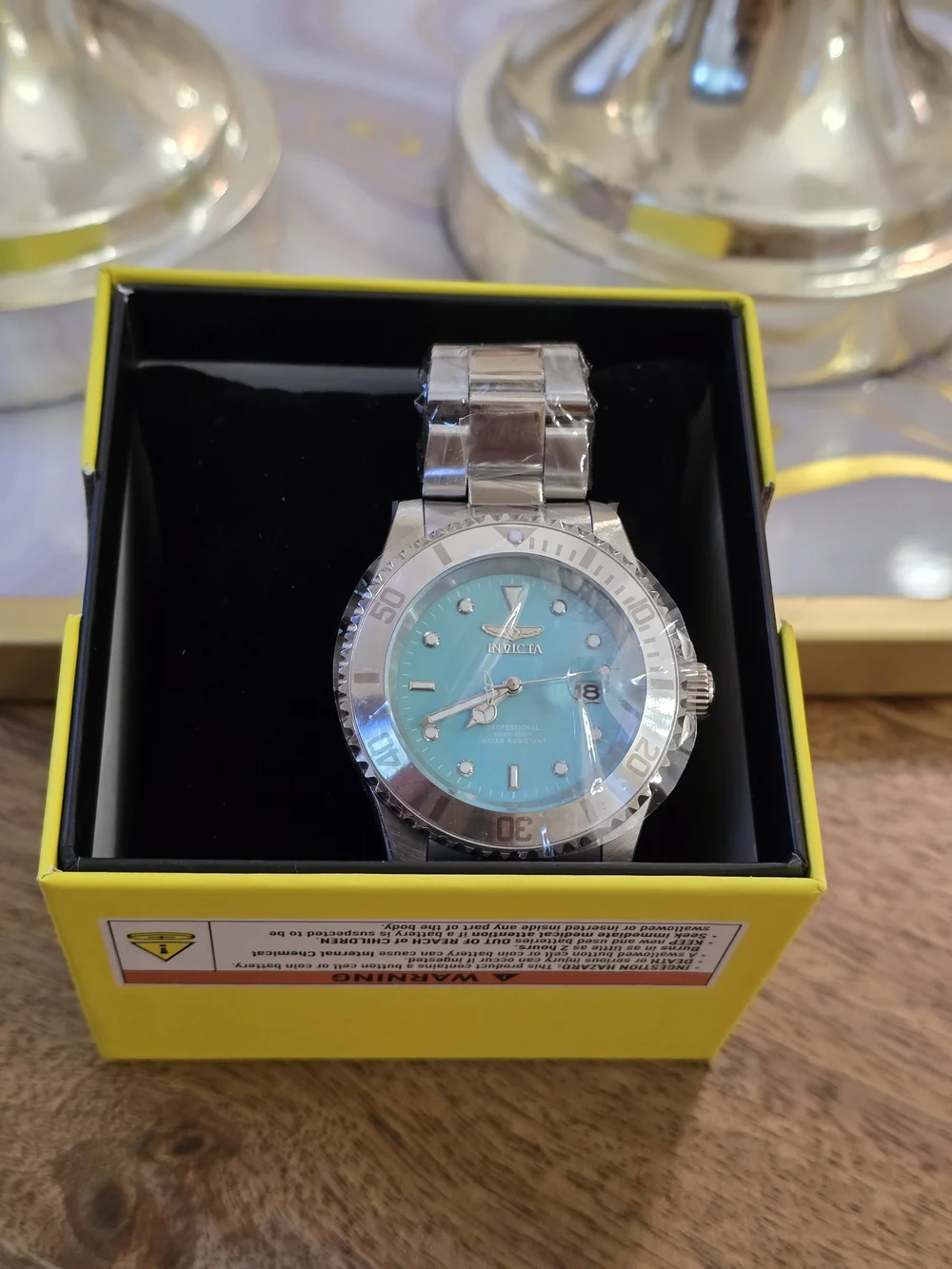 Invicta Men’s Professional Turquoise Dial Stainless Steel Dive Watch